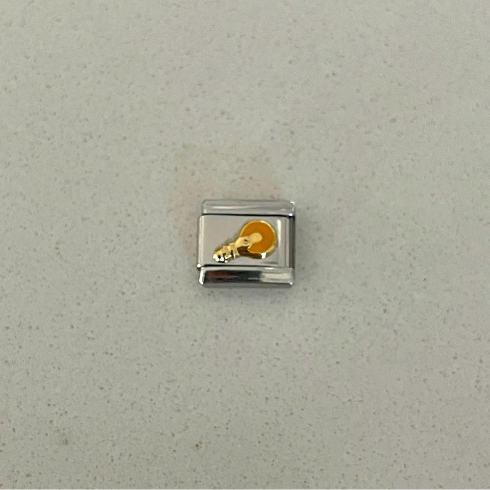 Zoppini stainless steel & gold lightbulb charm